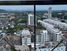 High-rise balcony view overlooking the city