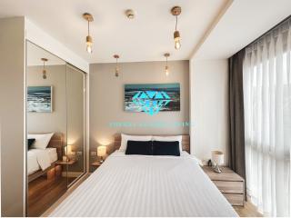 Elegant bedroom with a comfortable double bed and modern decor