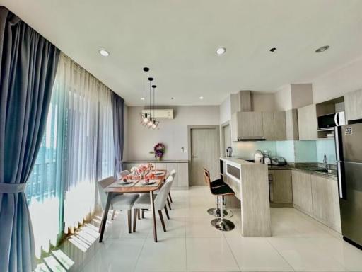 Modern kitchen and dining area with bright interior design