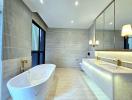 Spacious modern bathroom with freestanding bathtub and double vanity