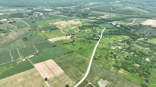 Aerial view of a rural landscape with road and fields