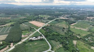 Aerial view of countryside with roads and green fields