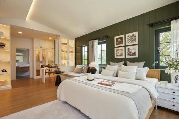 Spacious bedroom with en-suite bathroom and modern decor