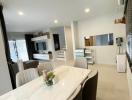 Modern kitchen interior with marble dining table and white decor