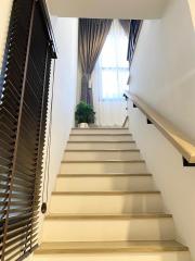 Elegant staircase with natural light