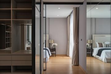 Modern bedroom with attached walk-in closet and en-suite bathroom