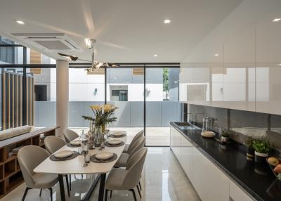 Modern spacious kitchen with attached dining area