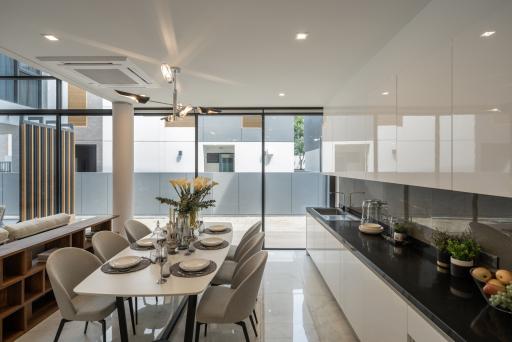 Modern spacious kitchen with attached dining area