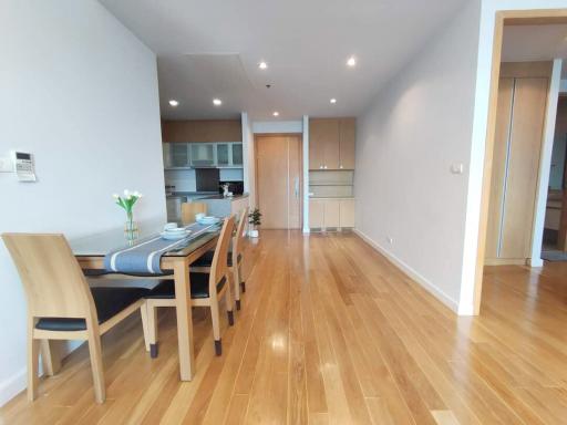 Spacious dining area with open concept kitchen and hardwood floors