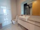 Modern bathroom with a walk-in shower and double vanity