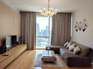 Modern living room with large windows and city view