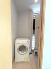 Compact laundry area with washing machine