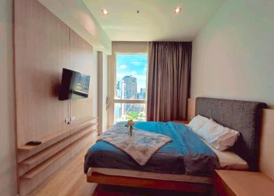 Cozy bedroom with city view