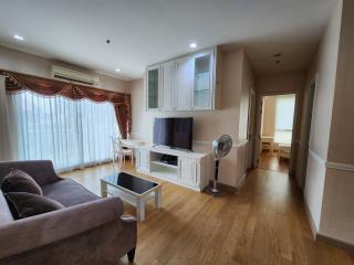 Spacious living room with modern furniture and open layout