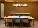 Modern dining room with stylish lighting and wooden elements