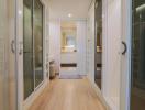 Spacious hallway with wooden floors and glass doors