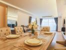 Elegant dining room with set table and modern decor