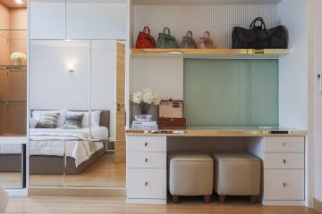 Modern bedroom with workspace and storage solutions