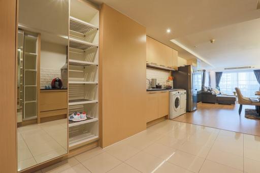 Modern kitchen with appliances and adjacent living area