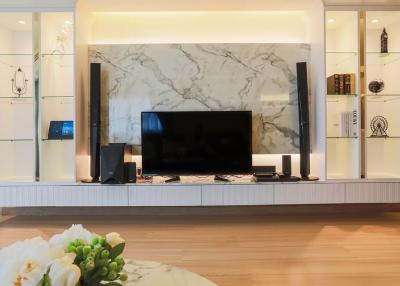Modern living room interior with marble wall mounted television area