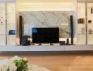 Modern living room interior with marble wall mounted television area