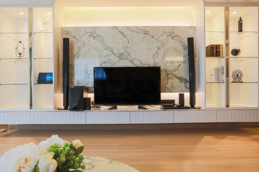 Modern living room interior with marble wall mounted television area