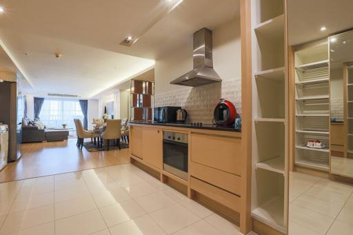 Modern kitchen with open floor plan connected to dining area