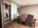 Spacious dining room with wooden flooring and modern decor