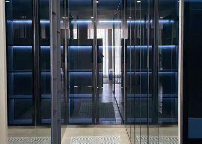 Elegant walk-in closet with mirrored doors and custom shelving