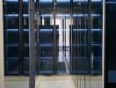 Elegant walk-in closet with mirrored doors and custom shelving