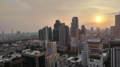 Panoramic view of city skyline at sunset