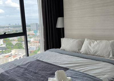 Cozy bedroom with city view