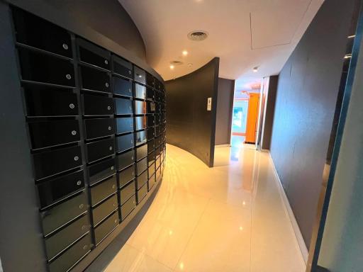 Modern building lobby with mailbox wall