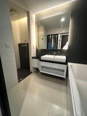 Modern bathroom with clean lines and white fixtures