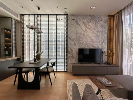 Modern living room with dining area and open kitchen