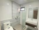 Modern bathroom with walk-in shower and sleek fixtures