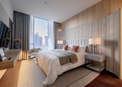 Modern bedroom with city view, large bed, and elegant decor