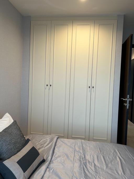 Cozy bedroom with a built-in wardrobe