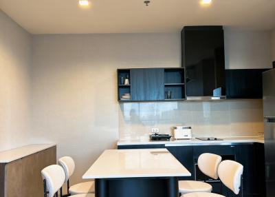 Modern kitchen with center island and bar stools