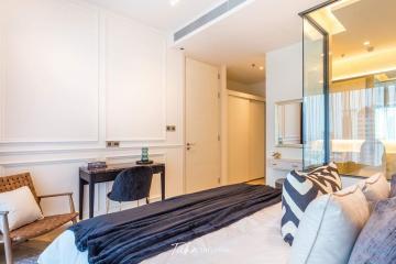 Modern bedroom with natural light and elegant decor