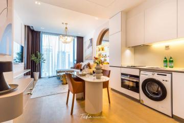 Modern and compact combined kitchen and dining space with ample lighting