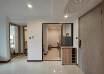 Bright and spacious hallway with large tiles and modern fittings