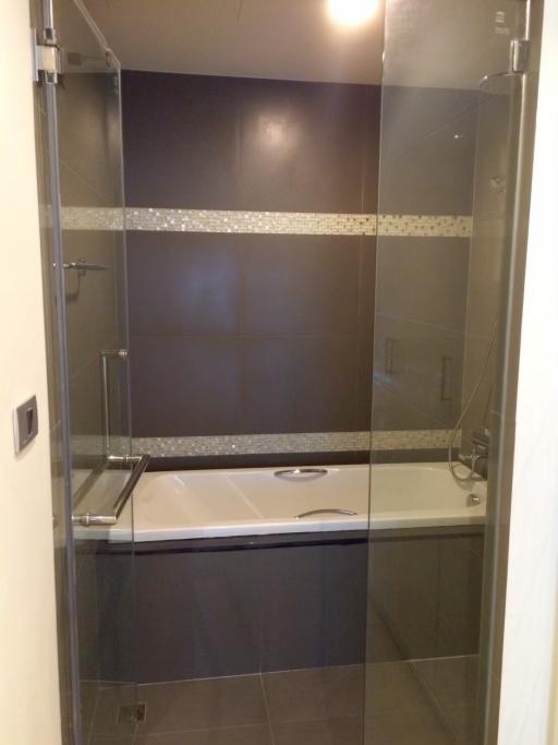 Modern bathroom with glass shower enclosure