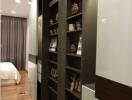 Modern bedroom with a built-in wardrobe and shelving unit