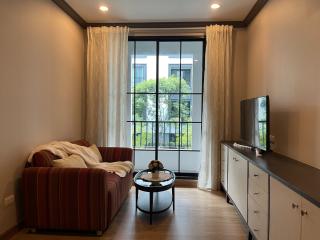 Cozy living room with natural light from large window