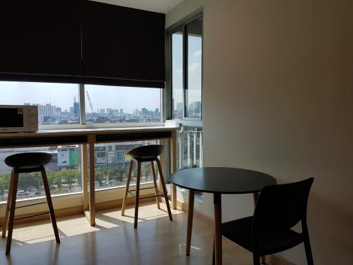 Modern living area with city view and natural lighting