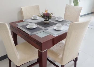 Modern dining room with a table set for four