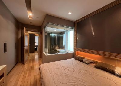 Spacious bedroom with large bed and en-suite bathroom