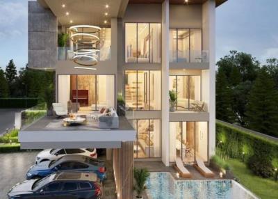Modern multi-level building with exterior living space, pool, and garage