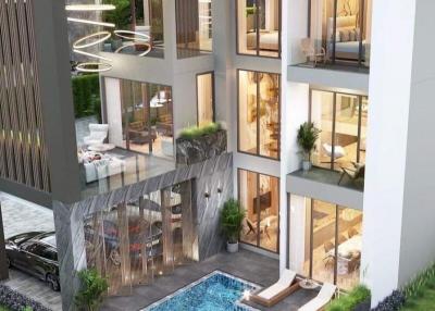Modern multi-story residential building with balconies and a swimming pool